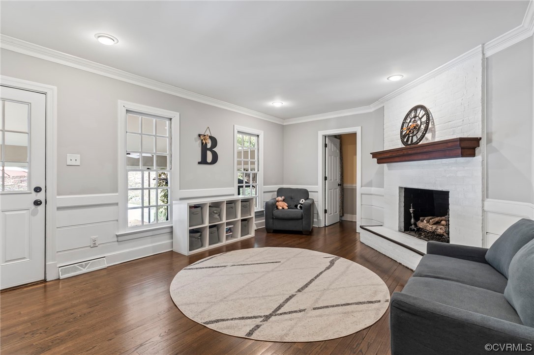 2320 Dorking Road North Chesterfield, VA 23236 - Photo 12 of 42 a living room with furniture and a fireplace