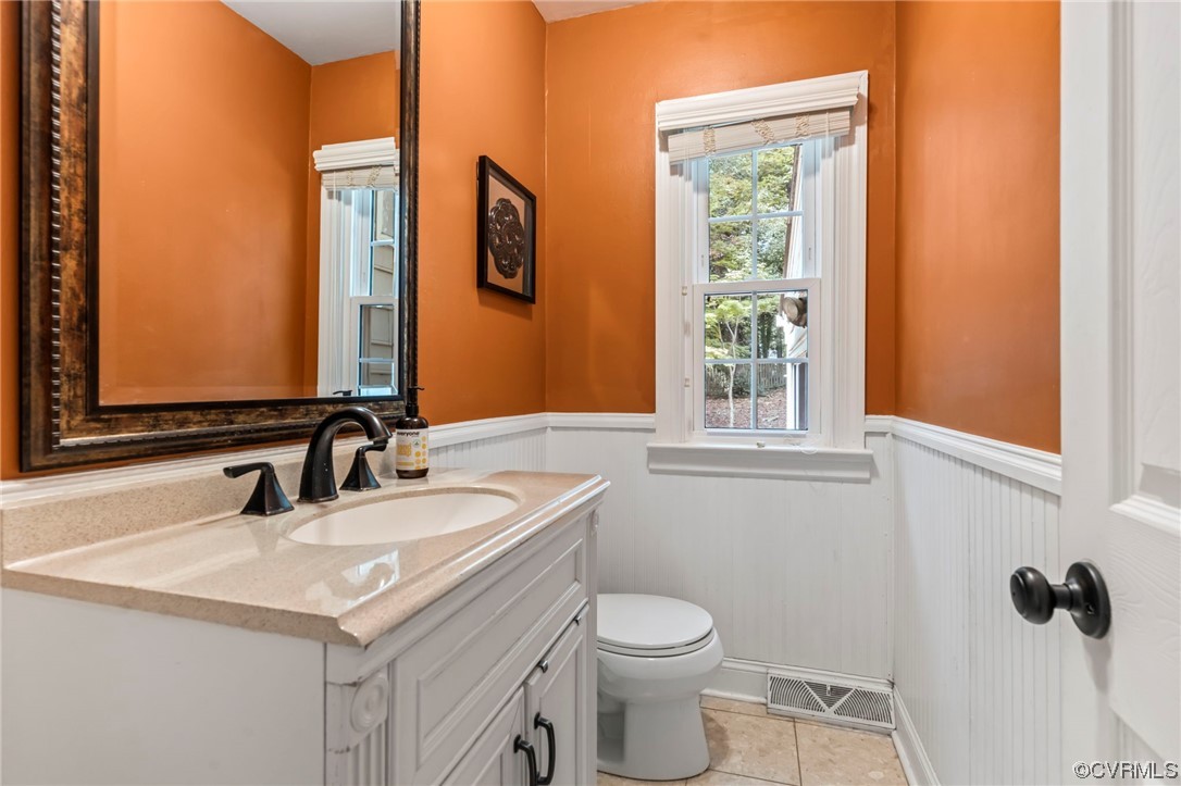2320 Dorking Road North Chesterfield, VA 23236 - Photo 13 of 42 a bathroom with a sink a toilet and mirror