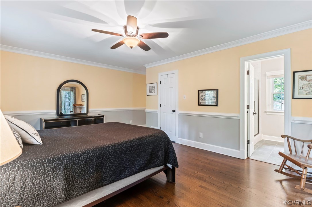 2320 Dorking Road North Chesterfield, VA 23236 - Photo 15 of 42 a bedroom with a bed and dresser with wooden floor
