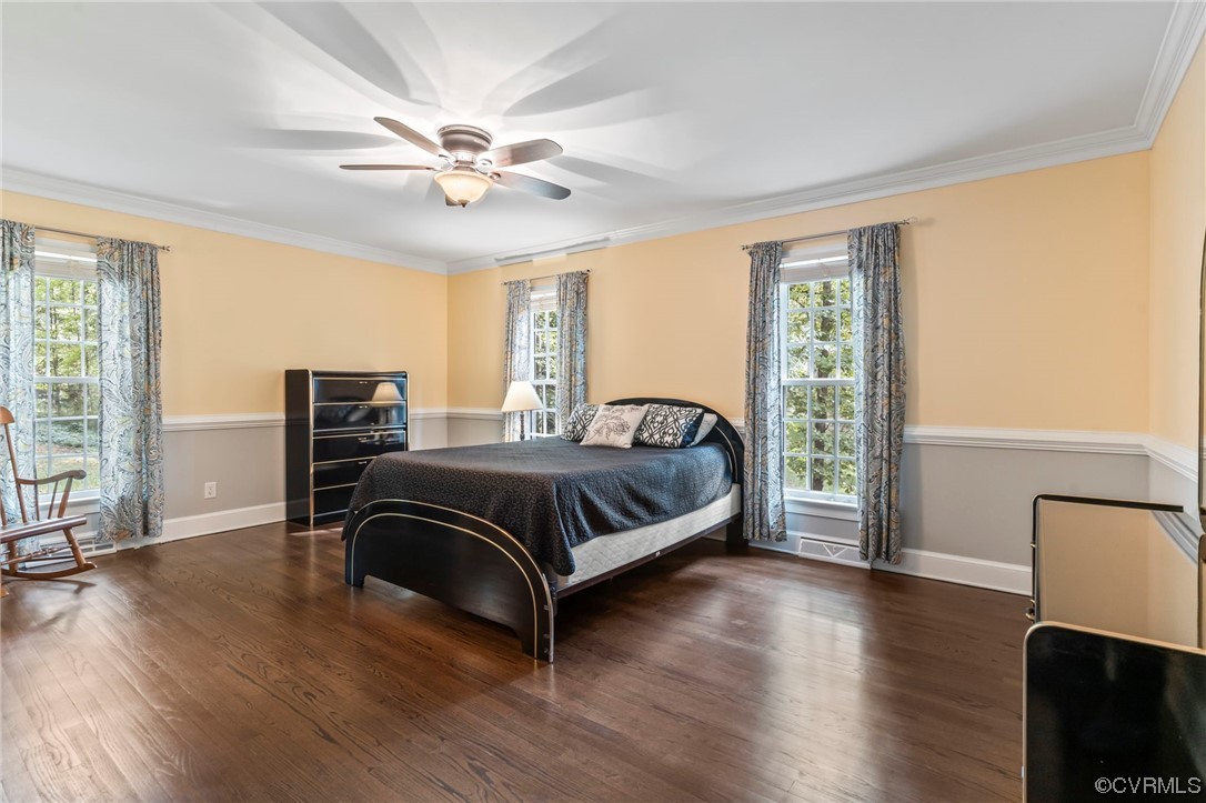 2320 Dorking Road North Chesterfield, VA 23236 - Photo 16 of 42 a bedroom with a bed and wooden floor