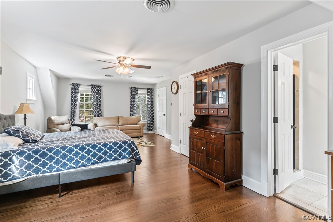 2320 Dorking Road North Chesterfield, VA 23236 - Photo 21 of 42 a bedroom with a bed and wooden floor