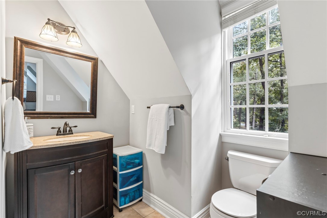 2320 Dorking Road North Chesterfield, VA 23236 - Photo 23 of 42 a bathroom with a toilet sink and mirror
