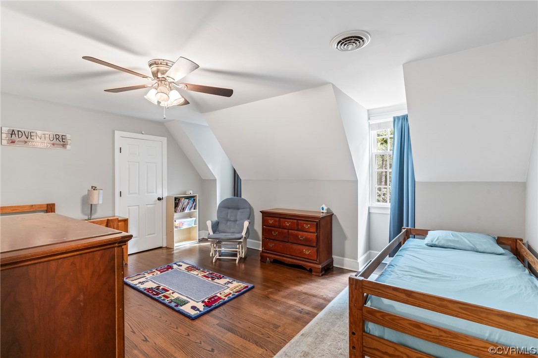 2320 Dorking Road North Chesterfield, VA 23236 - Photo 24 of 42 a bedroom with furniture and a chandelier
