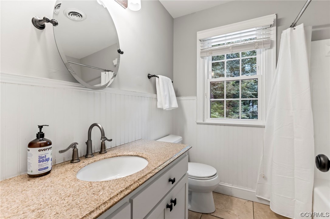 2320 Dorking Road North Chesterfield, VA 23236 - Photo 26 of 42 a bathroom with a granite countertop sink a toilet and a mirror