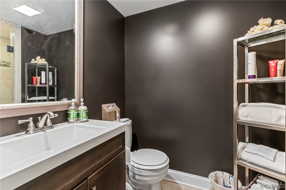 2320 Dorking Road North Chesterfield, VA 23236 - Photo 31 of 42 a bathroom with a sink a toilet and mirror