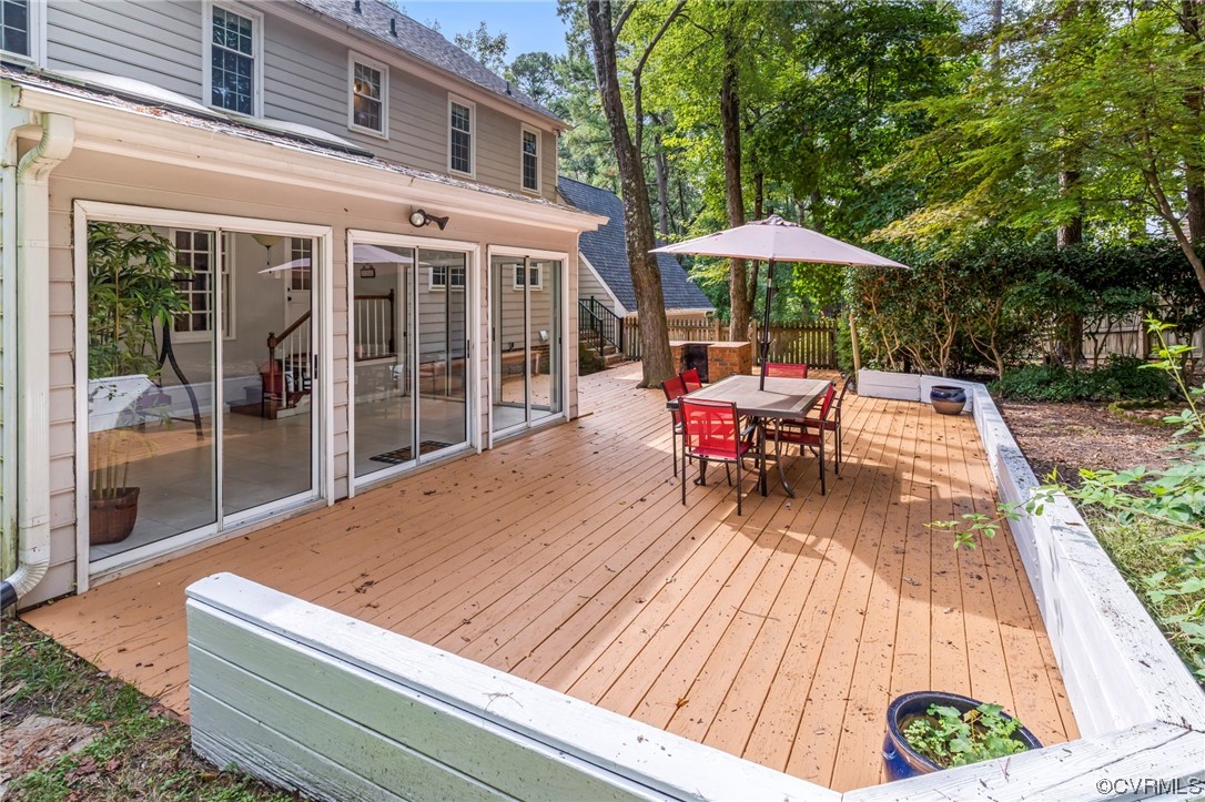 2320 Dorking Road North Chesterfield, VA 23236 - Photo 35 of 42 a wooden bench sitting in front of a building