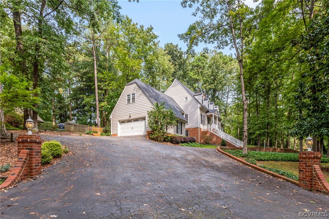 2320 Dorking Road North Chesterfield, VA 23236 - Photo 40 of 42 a view of a house with large trees and a small yard