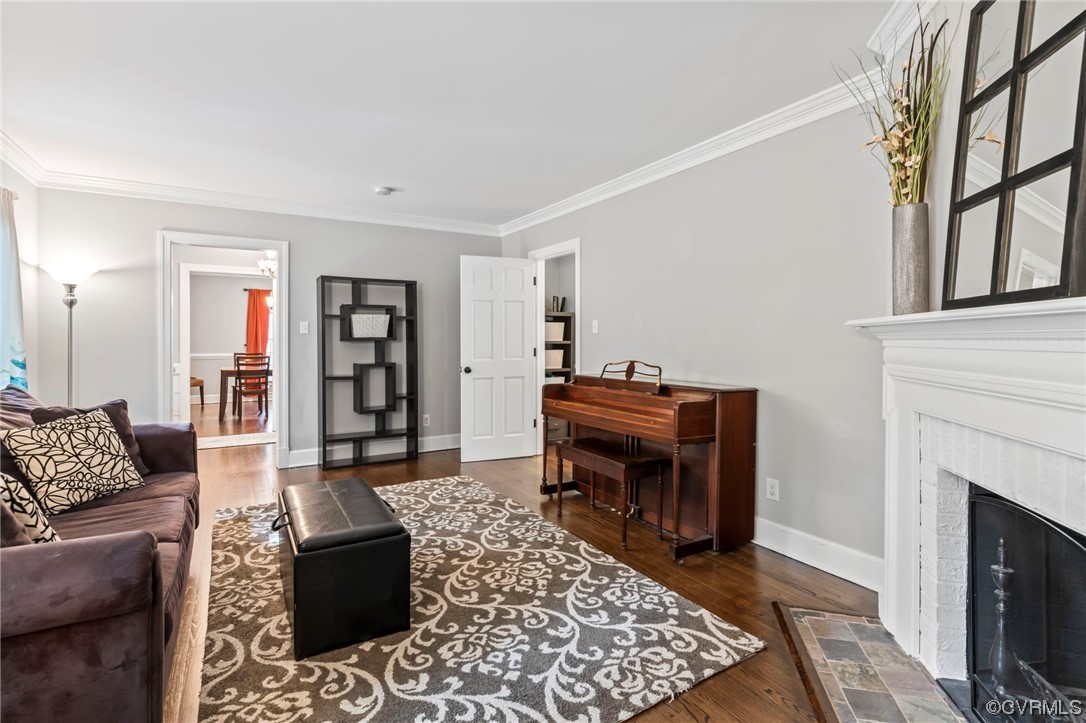 2320 Dorking Road North Chesterfield, VA 23236 - Photo 6 of 42 a living room with furniture a piano and a fireplace
