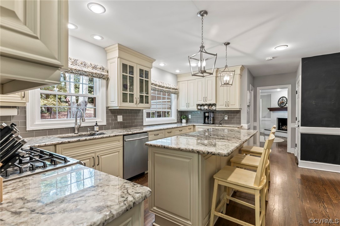 2320 Dorking Road North Chesterfield, VA 23236 - Photo 9 of 42 a kitchen with stainless steel appliances granite countertop a sink stove and refrigerator