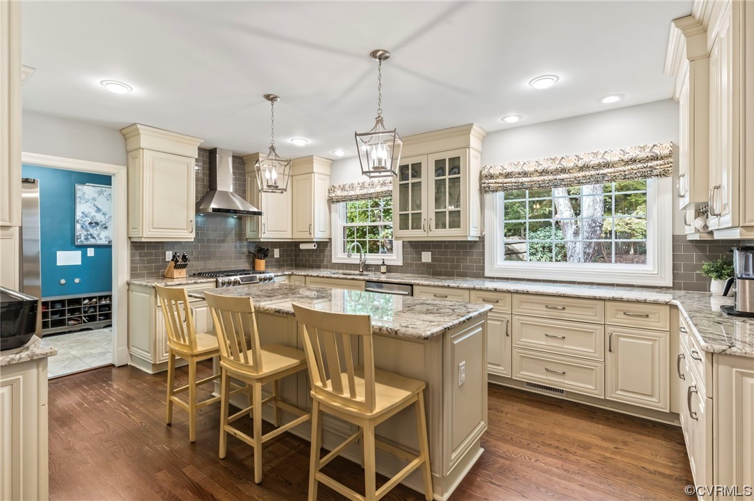 2320 Dorking Road North Chesterfield, VA 23236 - Photo 10 of 42 a kitchen with stainless steel appliances granite countertop a stove and white cabinets