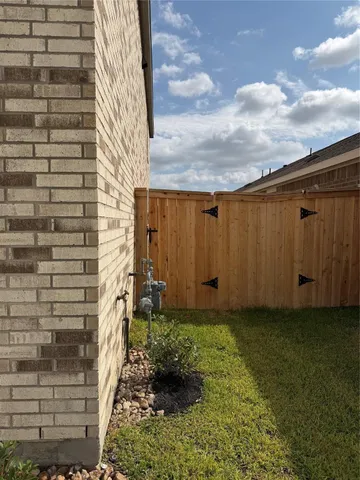 a view of a backyard with garden