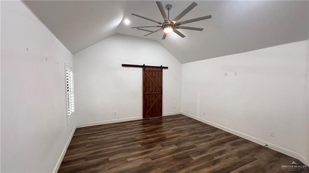 433 Redbud Avenue McAllen, TX 78504 - Photo 5 of 11 wooden floor in an empty room