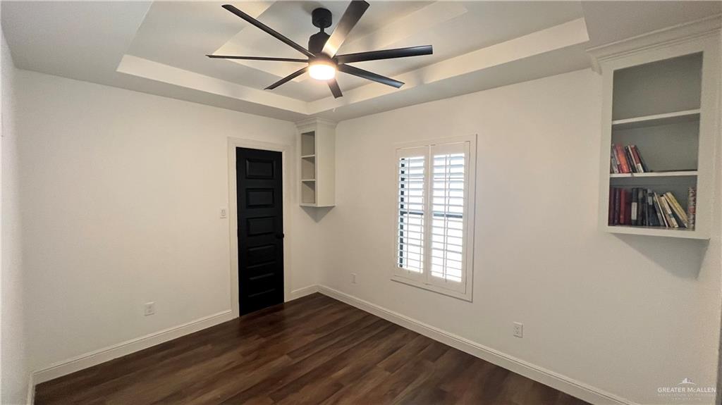 433 Redbud Avenue McAllen, TX 78504 - Photo 7 of 11 an empty room with closet and fan