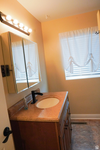 324 Stringtown Road Georgetown, ID 83239 - Photo 22 of 49 Bathroom with vanity and baseboards