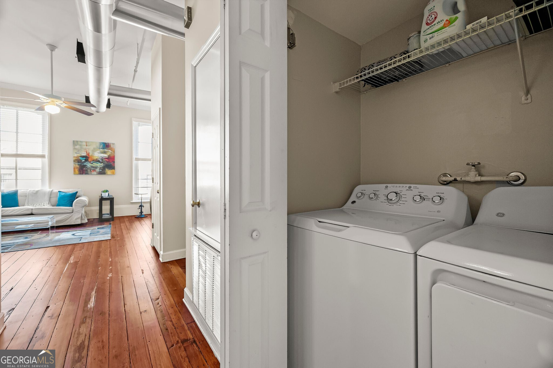 105 Whitaker Street, Unit 302 Savannah, GA 31401 - Photo 15 of 39 a view of storage and utility room with washer and dryer