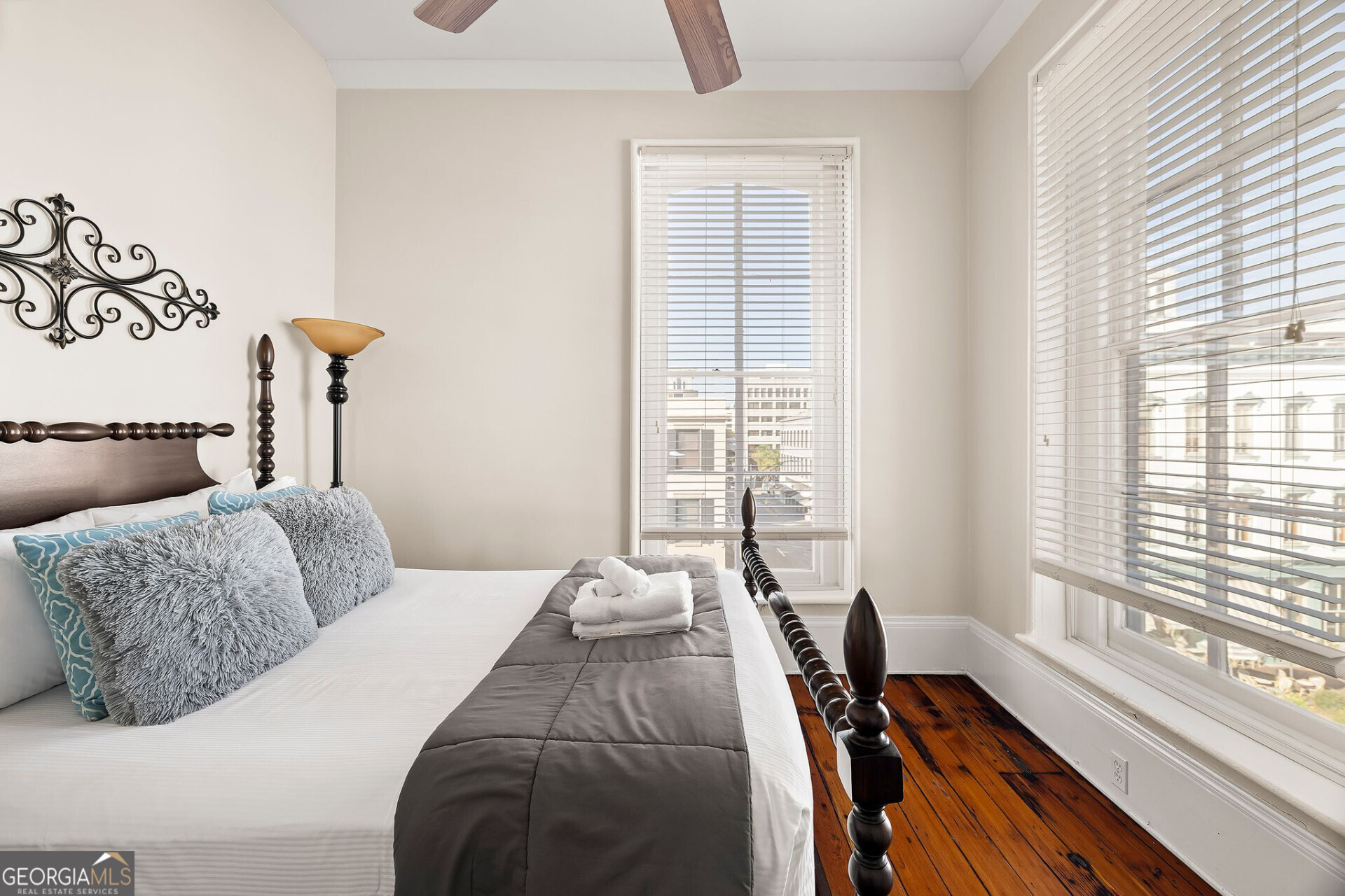 105 Whitaker Street, Unit 302 Savannah, GA 31401 - Photo 31 of 39 a bedroom with bed and a window