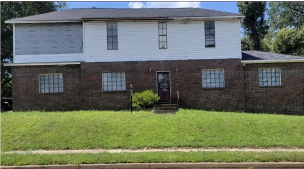 a front view of a house with windows