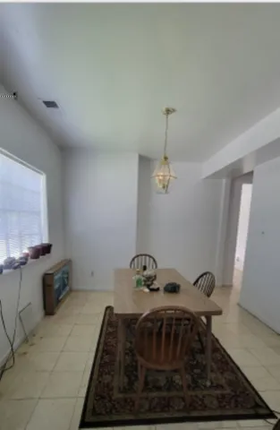 a view of a room with wooden walls