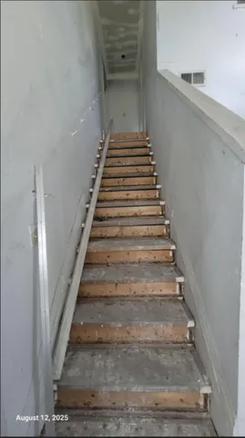 a bathroom with a toilet and a sink