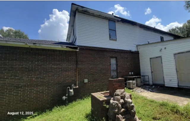 a front view of a house with windows