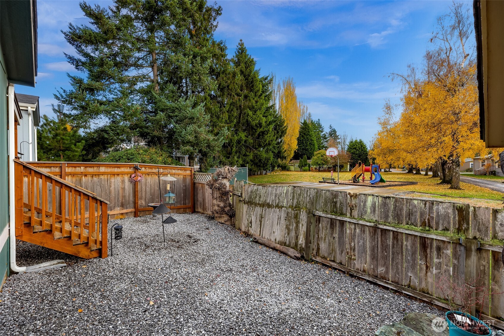 2392 Douglas Road, Unit 57 Ferndale, WA 98248 - Photo 23 of 26 a view of street with wooden fence