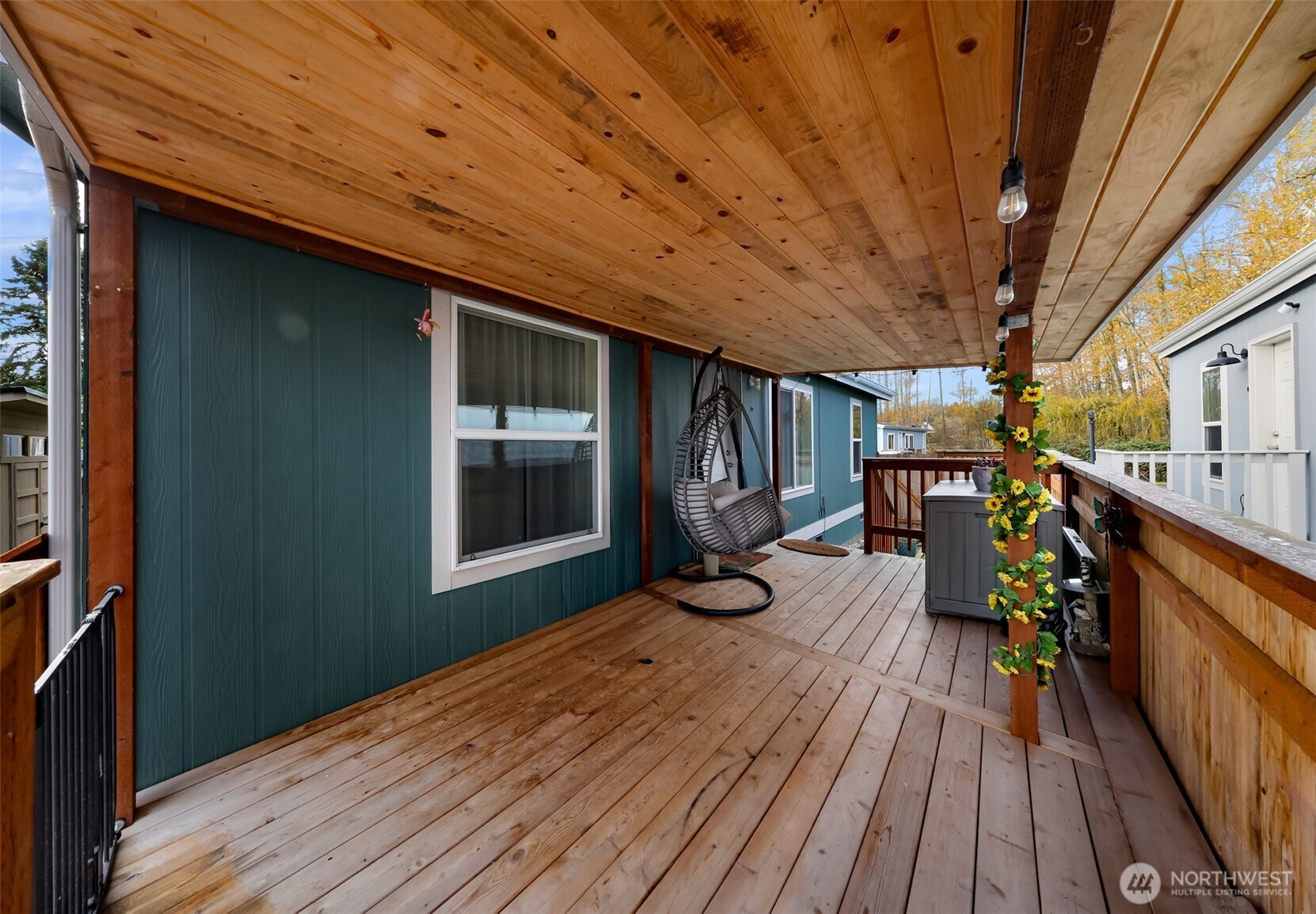 2392 Douglas Road, Unit 57 Ferndale, WA 98248 - Photo 3 of 26 a view of a patio with wooden floor