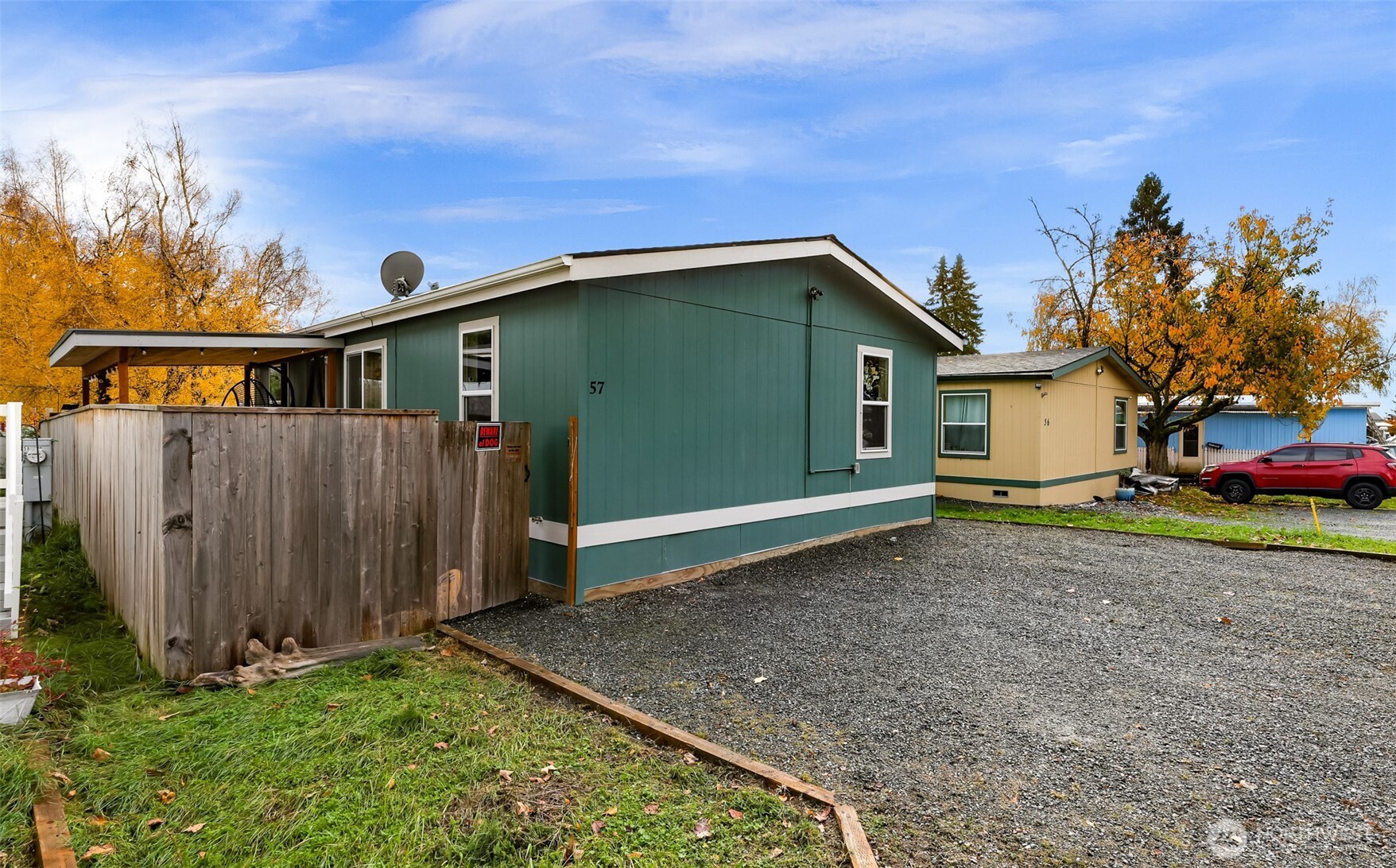 2392 Douglas Road, Unit 57 Ferndale, WA 98248 - Photo 4 of 26 a backyard of a house with lots of green space