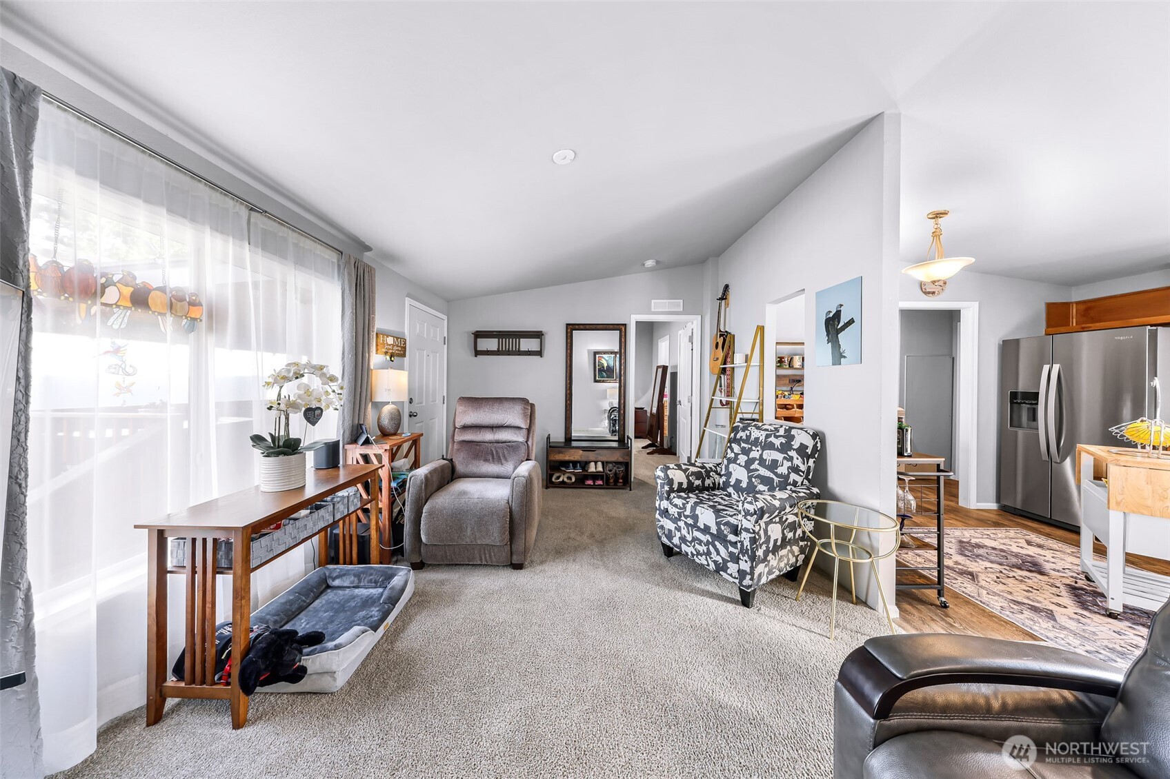 2392 Douglas Road, Unit 57 Ferndale, WA 98248 - Photo 9 of 26 a living room with furniture and a large window