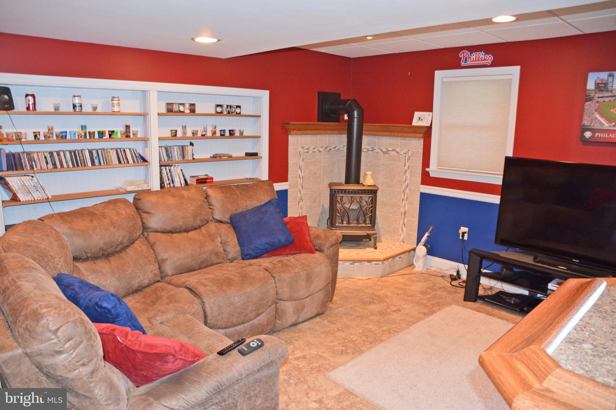 1749 Wilderness Road Lancaster, PA 17603 - Photo 40 of 54 Gas Log Stove is great in the Wintertime!