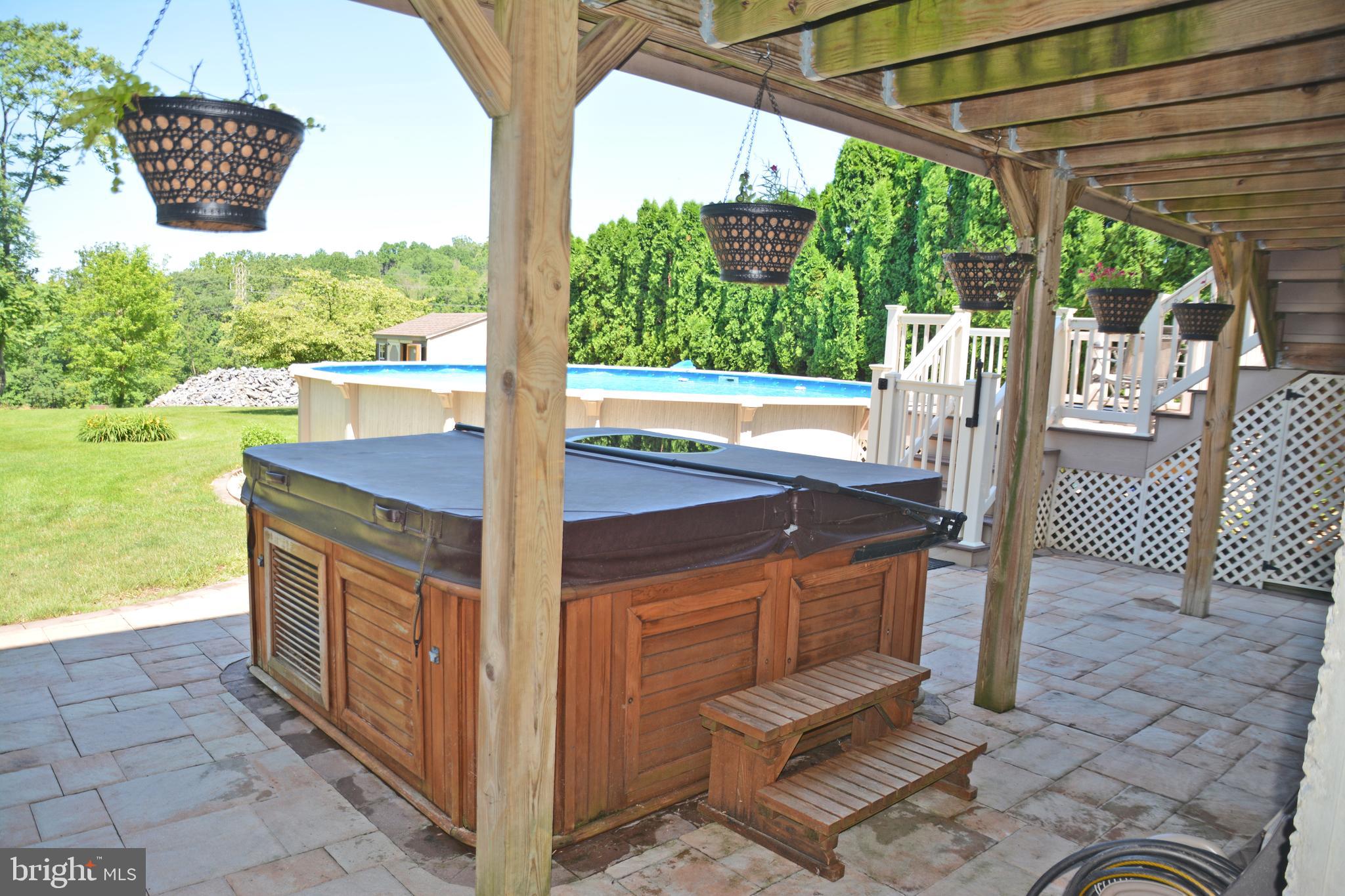 1749 Wilderness Road Lancaster, PA 17603 - Photo 42 of 54 View of Hot tub, pool & Backyard from Family Room
