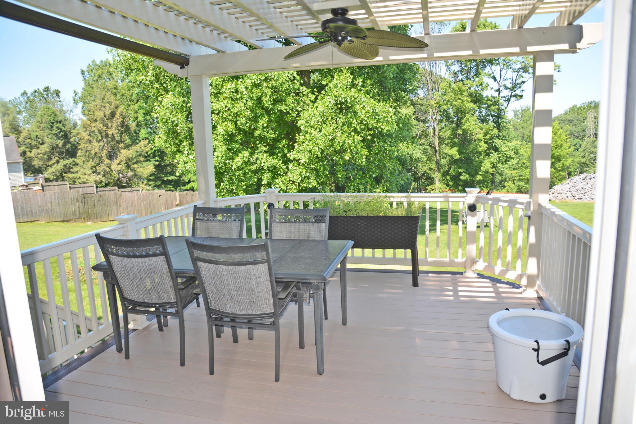 1749 Wilderness Road Lancaster, PA 17603 - Photo 43 of 54 Deck and trellis looking over Backyard and Pool