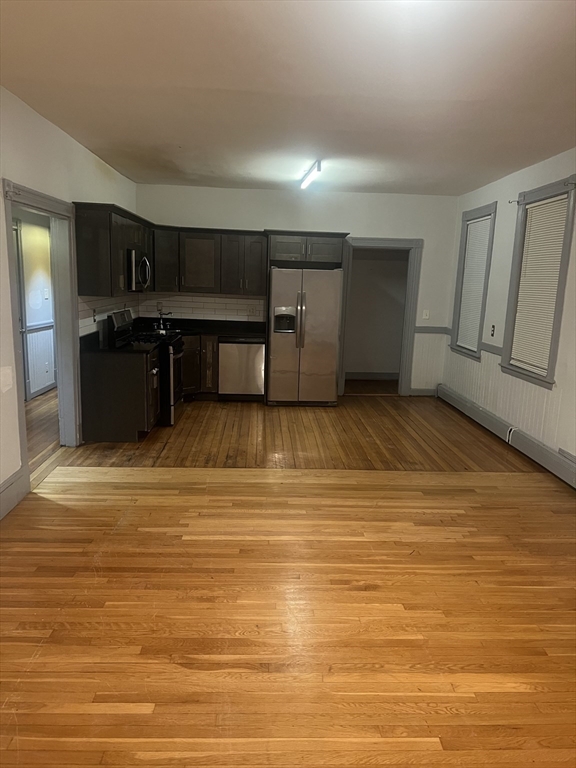 a view of a kitchen with a sink