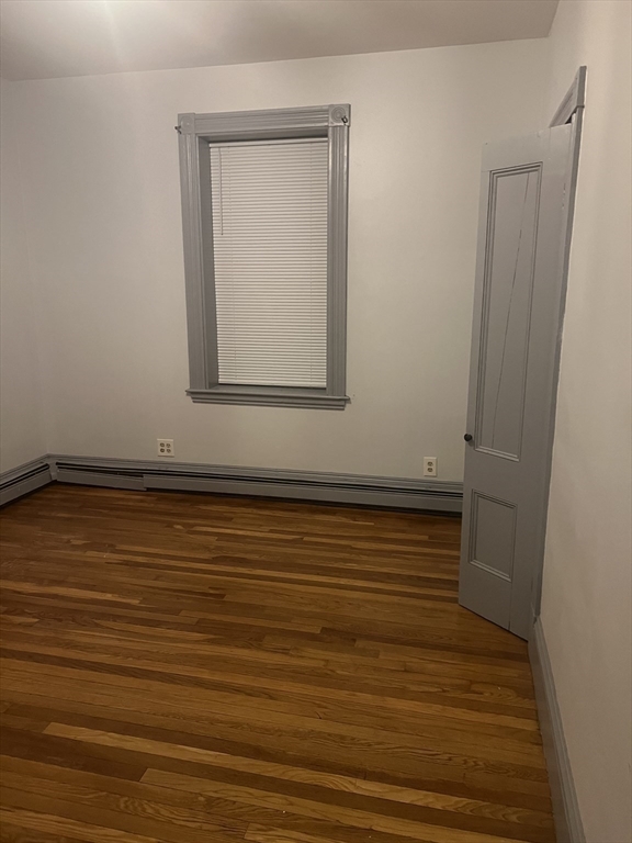4 Herbert Street, Unit 2 Boston, MA 02124 - Photo 11 of 12 a view of small space with wooden floor