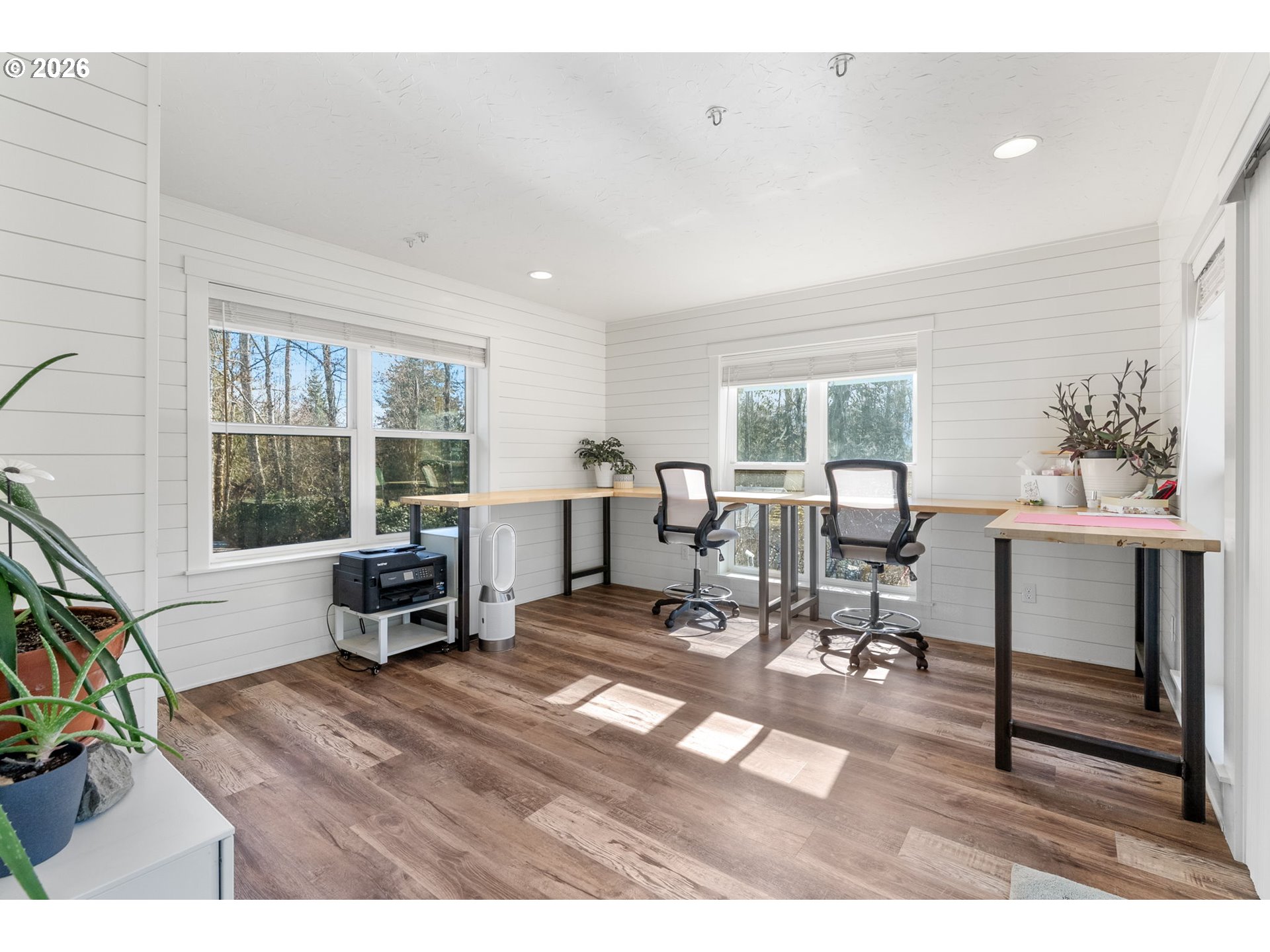 92 Rancho Del Oro Road Stevenson, WA 98648 - Photo 15 of 45 a living room with furniture a window and a dining table with wooden floor
