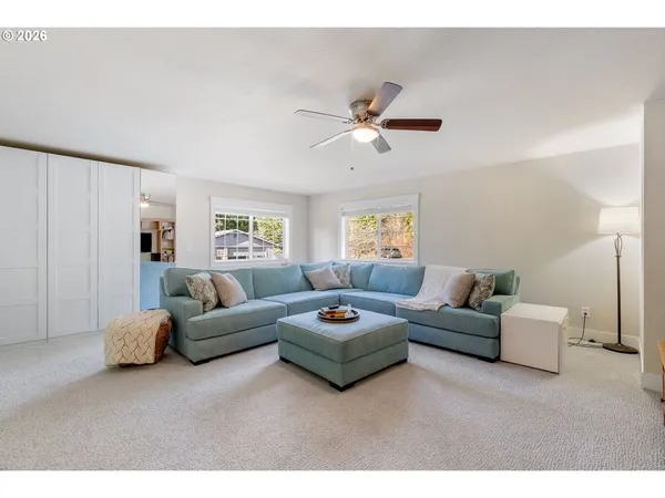a living room with furniture and a couch