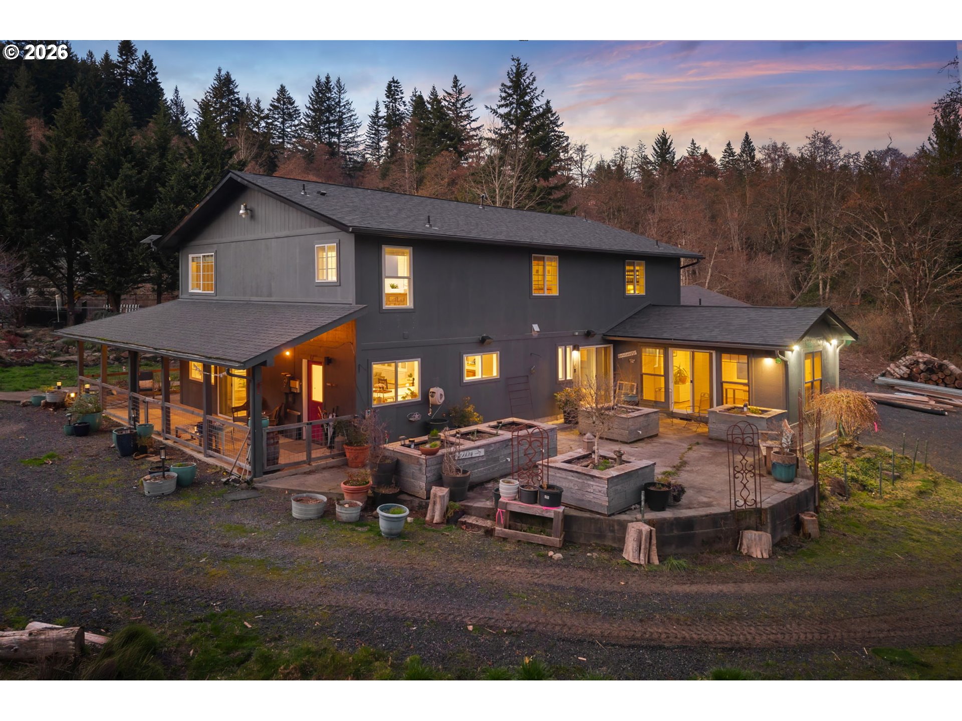 92 Rancho Del Oro Road Stevenson, WA 98648 - Photo 32 of 45 a backyard of a house with table and chairs