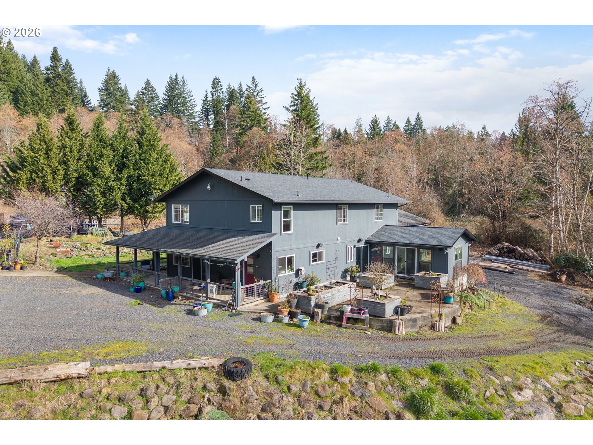 92 Rancho Del Oro Road Stevenson, WA 98648 - Photo 33 of 45 a view of a house with garden and sitting area