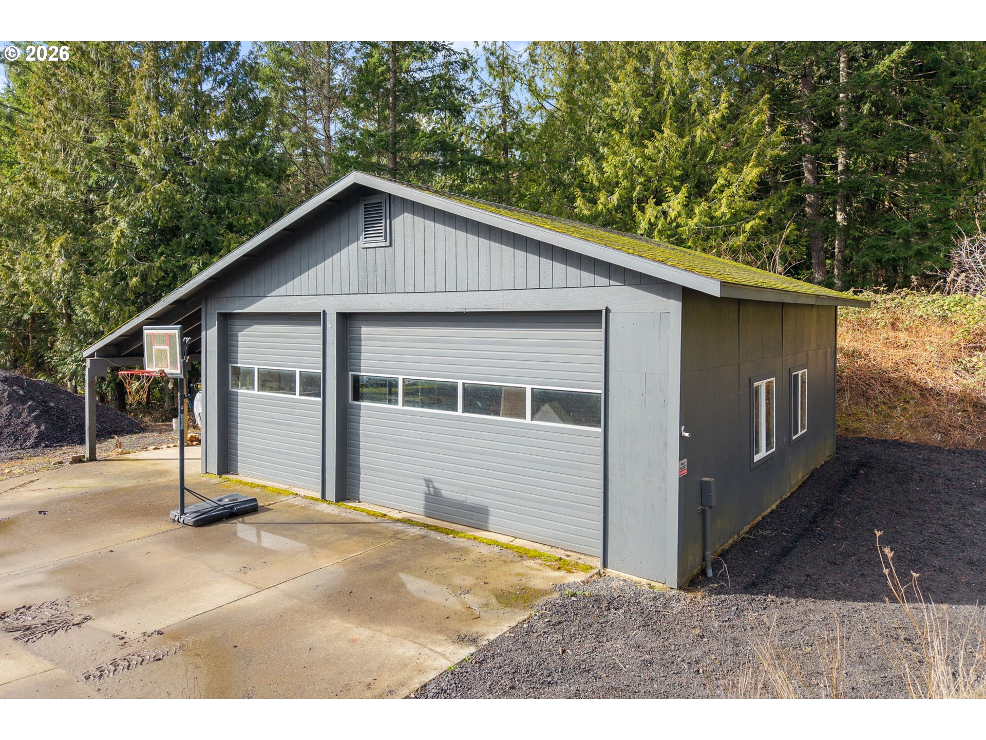 92 Rancho Del Oro Road Stevenson, WA 98648 - Photo 38 of 45 a view of a house with a backyard