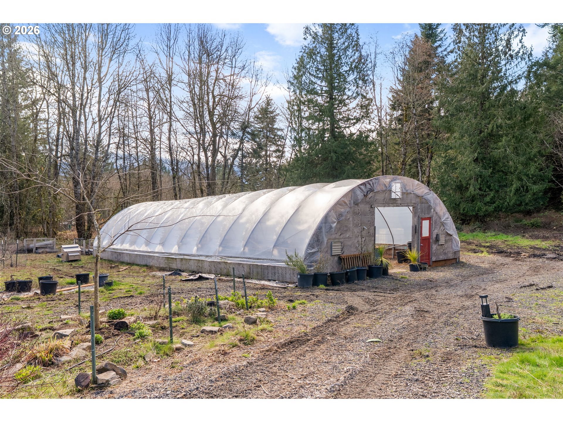 92 Rancho Del Oro Road Stevenson, WA 98648 - Photo 41 of 45 a backyard of a house with barbeque oven and outdoor seating