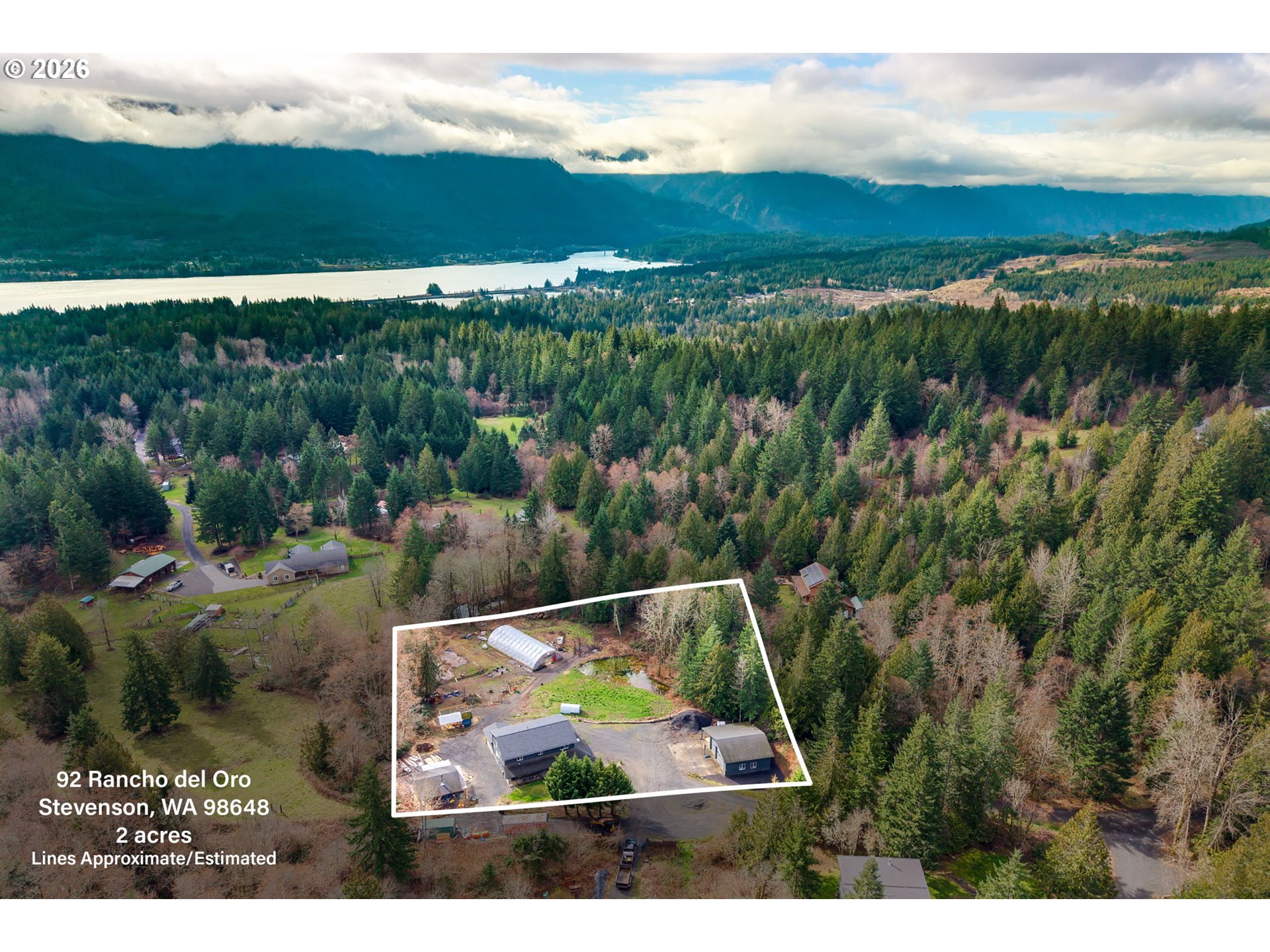 92 Rancho Del Oro Road Stevenson, WA 98648 - Photo 44 of 45 a view of a yard with a lake view