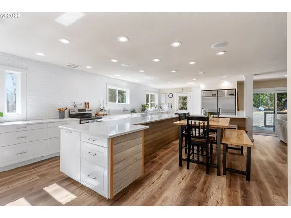 a kitchen with counter top space and sink