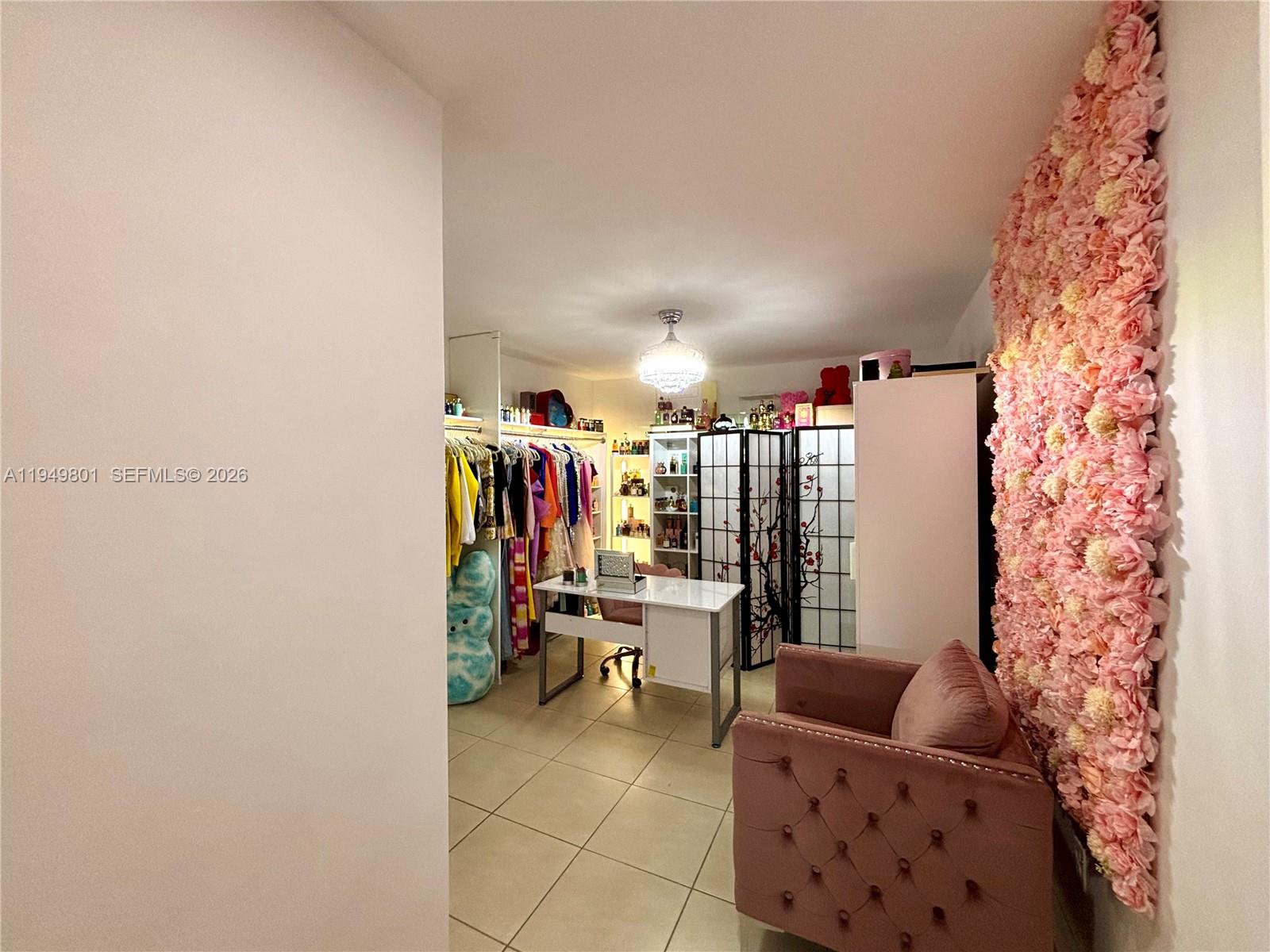 8384 Southwest 154th Avenue, Unit 68 Miami, FL 33193 - Photo 18 of 47 a view of a livingroom with workspace and a couch