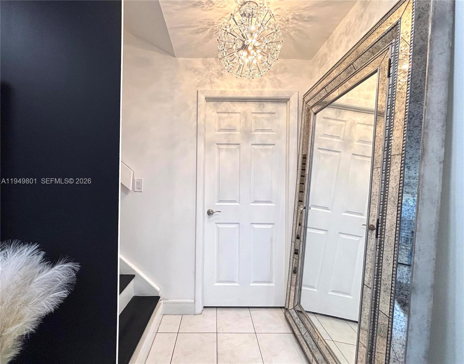 8384 Southwest 154th Avenue, Unit 68 Miami, FL 33193 - Photo 39 of 47 a view of a hallway with a window