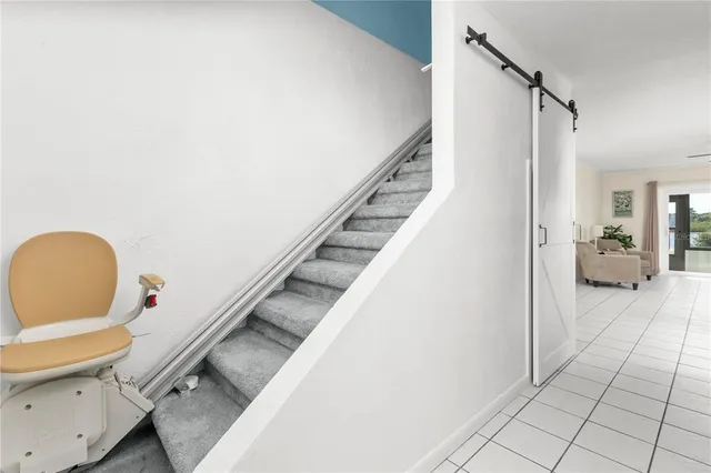 an empty room with an outdoor view and a window