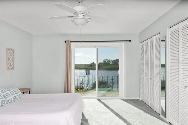 a view of a glass door and the balcony
