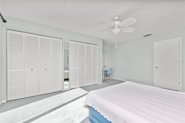 a view of ocean with a lake from a tub