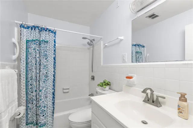a kitchen with sink cabinets and window