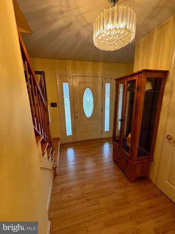a view of an entryway with hardwood