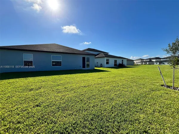 a view of a house with a swimming pool