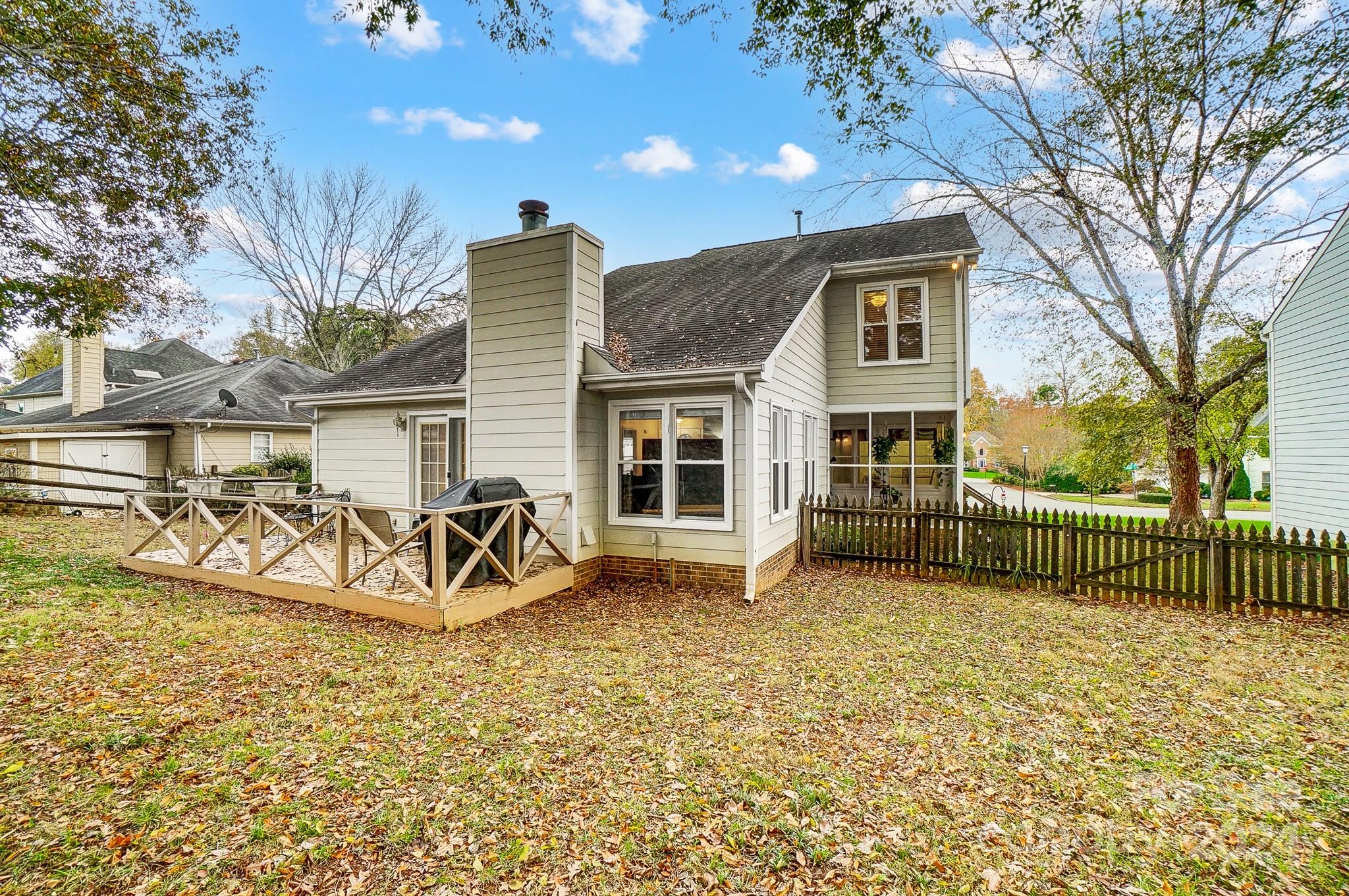 10454 Fairway Ridge Road Charlotte, NC 28277 - Photo 36 of 41 a view of a house with backyard porch and sitting area